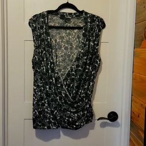 Green sleeveless crossover blouse